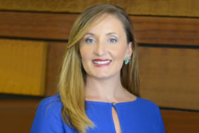 Head shot of Senior Fellow Francesca Spidalieri smiling at the camera