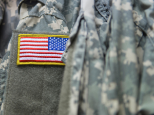 Close up of a United States Army uniform and its American flag patch