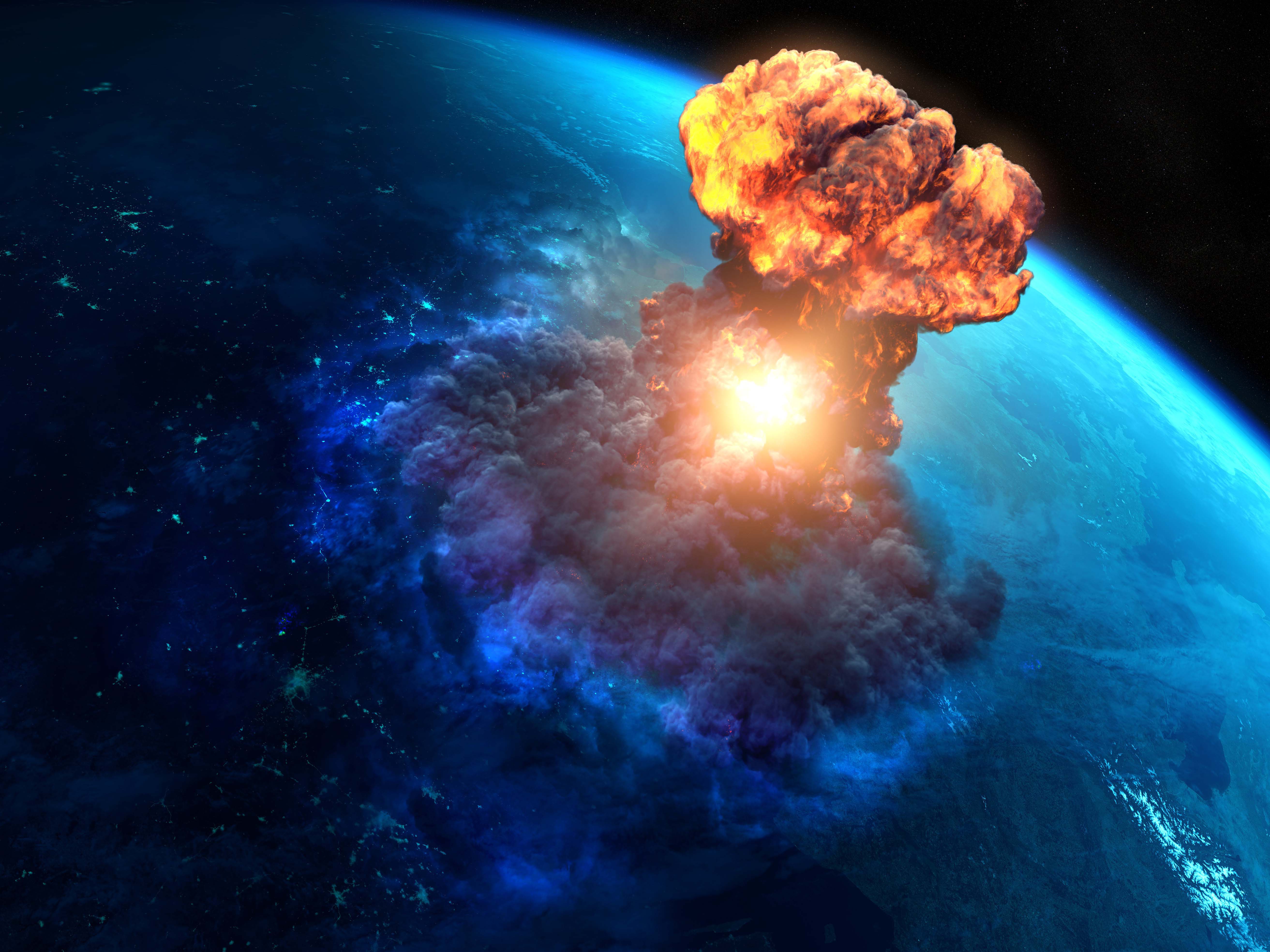 Image of a large mushroom cloud extending out from the surface of the Earth into space
