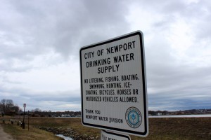 Sign outside of a Newport city water supply site asking that visitors refrain from littering, fishing, boating, swimming, hunting, ice-skating, cycling and the use of motorized vehicles.