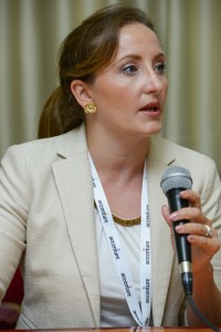 Pell Center Senior Fellow Francesca Spidalieri speaks candidly into a microphone at a cybersecurity conference in Tel Aviv, Israel.