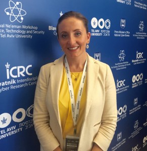 Pell Center Senior Fellow Francesca Spidalieri stands in front of a banner promoting the Cyber Week conference in Tel Aviv, Israel.