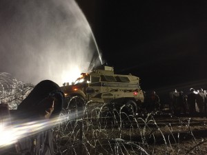 Tank sprays water cannons