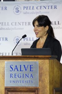 Daphne Matziaraki, a Greek documentary filmmaker, at the podium at Salve Regina University