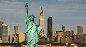 Statue of Liberty with NYC in the background.